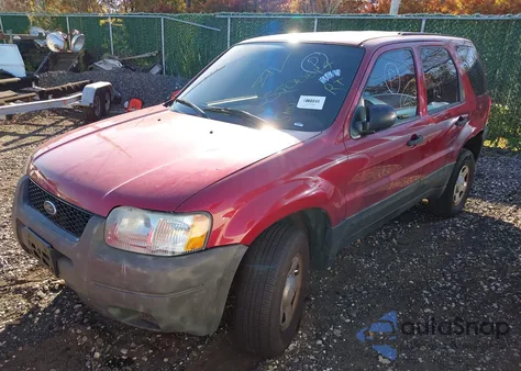 2004 Ford Escape Xls z USA, uszkodzony, nr VIN 1FMYU92144KB36011